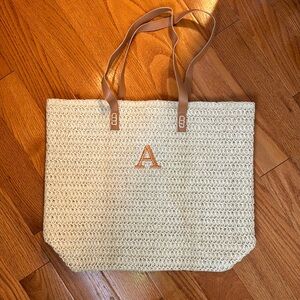 Perfect beach tote! Embroidered A on front. Never been used.
